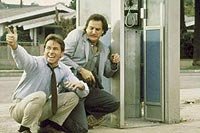 Image from: Real Men (1987)